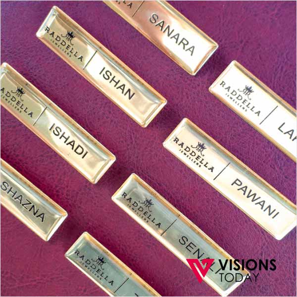 Visions Today offers customized Name Badge printing with Coating in Sri Lanka and Maldives. We offer premium quality printed name tags with coating ( Dome ). You can request us to use single or double pin, safety pin or magnet to attach the badge. Single pin and magnetic attaches can be used if you need it not to harm your dress. But magnetic attached will remove accidentally and you will lose the name badge. It brings more safety and durability by doming a badge after printing.